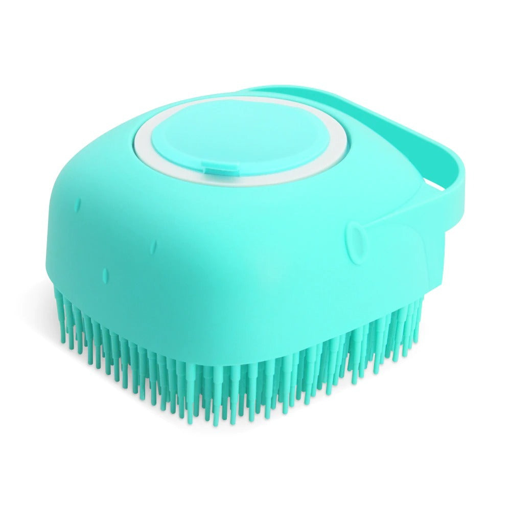 Turquoise siliconen shampoo- en massageborstel voor huisdieren, met zeepdispenserfunctie en zachte nopjes.