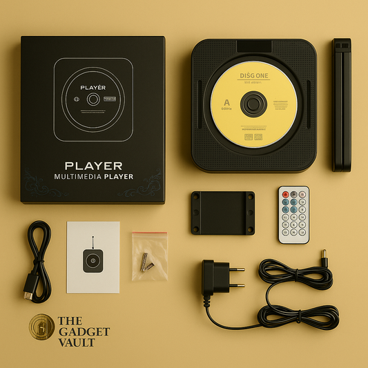 Multifunctionele zwarte CD-speler met Bluetooth en afstandsbediening, inclusief doos, stroomadapter, muurbeugel, schroeven, USB-kabel en handleiding, gepresenteerd op een beige achtergrond met The Gadget Vault-logo linksonder.